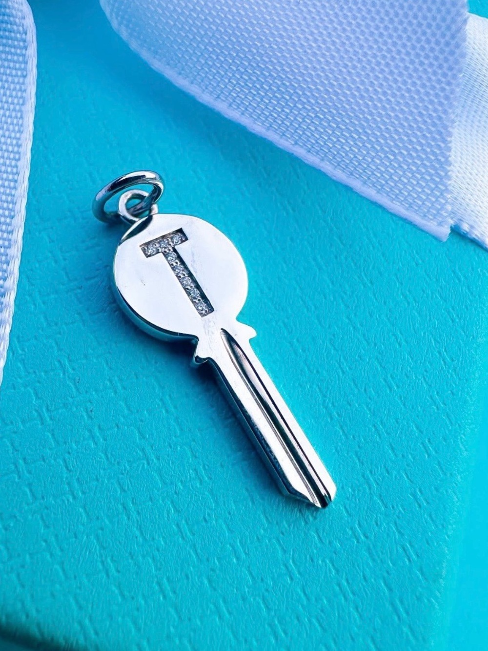 Tiffany & Co Diamond and White Gold T Mini Key Charm